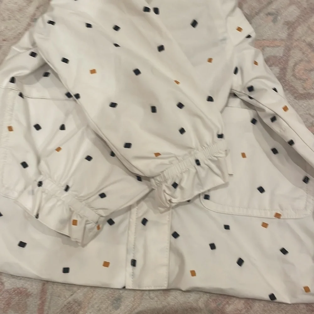 Miles Raincoat in white black and mustard yellow confetti pieces - Picture 2 of 5